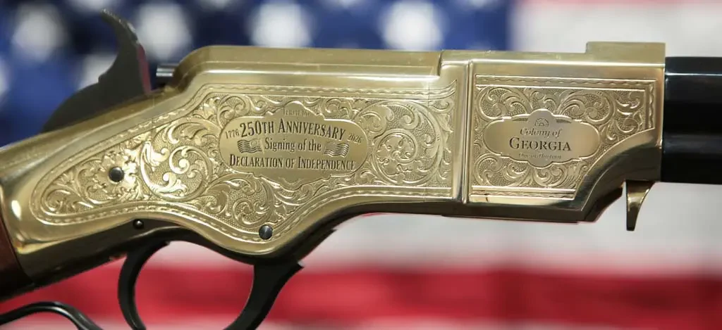 The main engraving on the right side of the receiver features the historic 1776 and 2026 dates with the original 13-star and modern 50-star flag and name of Colony recognized by this rifle.